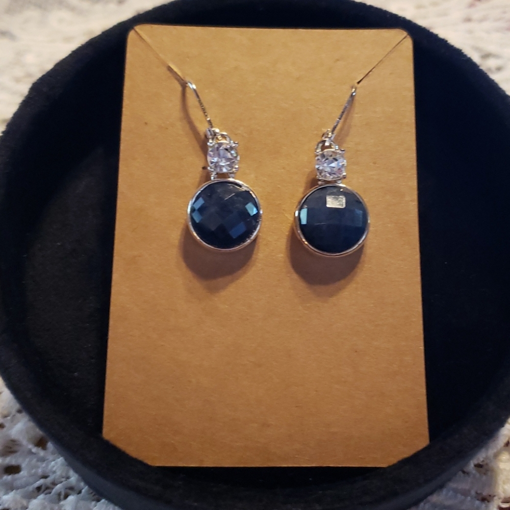 Beautiful silver tone earrings w/ dark blue stone!